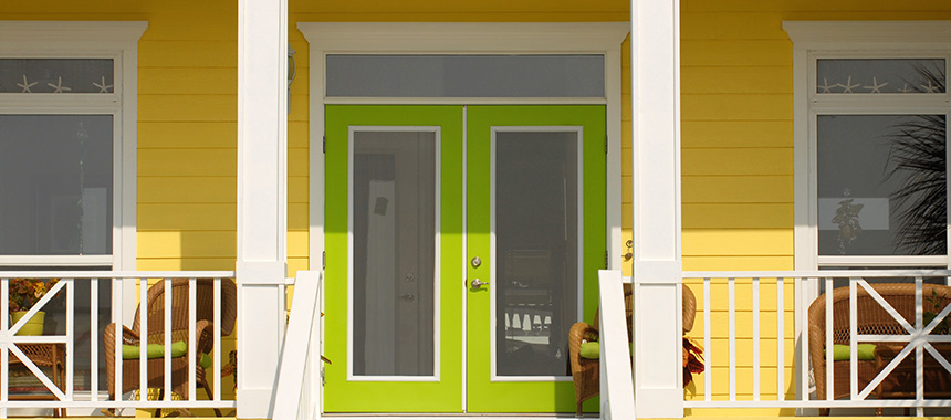 Green front door with windows